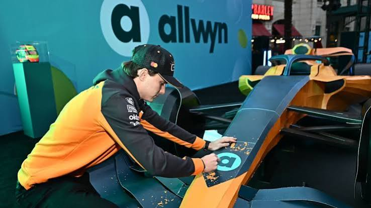 Oscar Piastri scratching the Allwyn McLaren scratch car